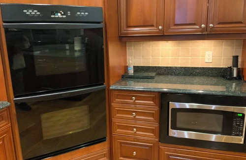 Oxford House | Luxury 4-bedroom House with Indoor Pool & Picturesque Backyard w/Grill & Firepit