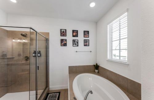 Lewisville House | Luxury Oasis - Glam Decor, Putting Green, Arcade Fun & EV Station