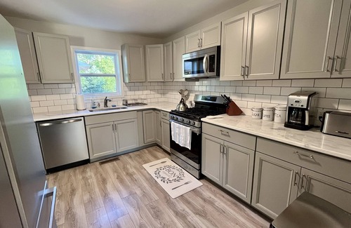 East Stroudsburg House | Luxury Pocono 4 BR w/Game Room, Fire Pit, Playground