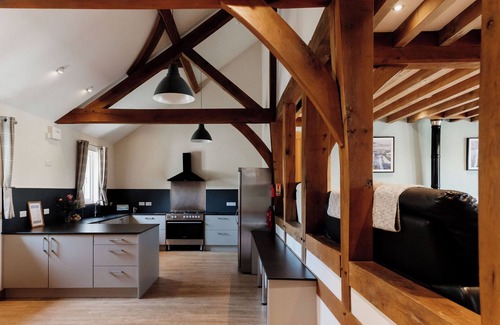 Devils Bridge House | Luxury renovated barn in the countryside with a large hot tub sleeping up to 38. Pets welcome
