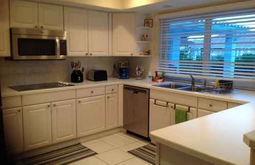 Landings House | Luxury Tropically Landscaped Waterfront Pool Home With Dock Bring Any Size Boat
