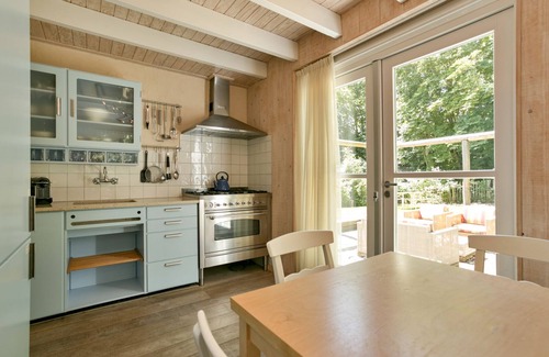 Ouddorp House | Luxury vacation home with sweeping views adjacent to nature reserve, beach and dunes within walking distance.