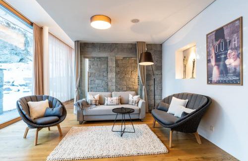 Flims Apartment | Luxus-Mountain-Suite Rocca Bella mit Dampfbad & saisonalem Aussen-Pool