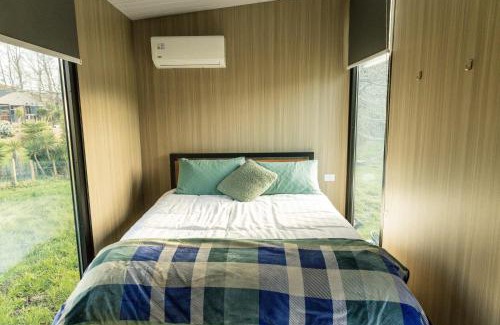 Waihi House | Misty Mountain View by Tiny Away