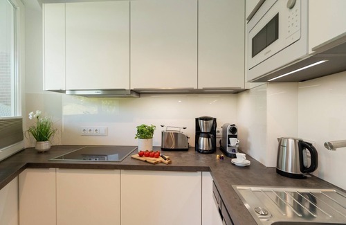 Westerland Apartment | Modern 2-room apartment with terrace, parking space, WLAN. Pets allowed.