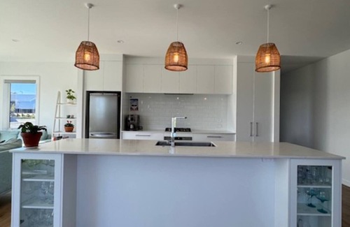 Wharewaka House | Modern and cosy home Private, fully fenced