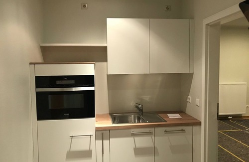 Bad Essen Apartment | Modern apartment with a fireplace in a listed half-timbered house on the market square