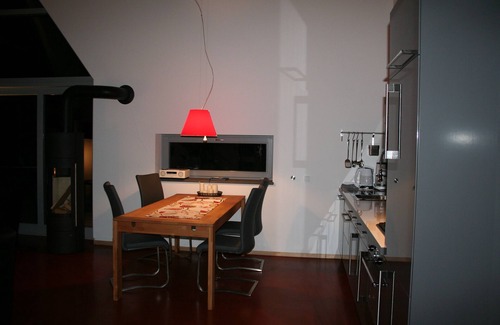 Roth House | Modern, panoramic windows with views of nature, fireplace, sauna