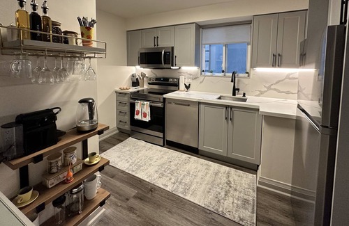 Woodbine Gardens House | Modern retreat in the city w/firepit, covered back porch, in suite laundry, WFH,