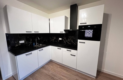 Goirle Apartment | Modern stay with parking, high-speed WiFi, and a cozy ambiance near Tilburg. Sleeps four guests.