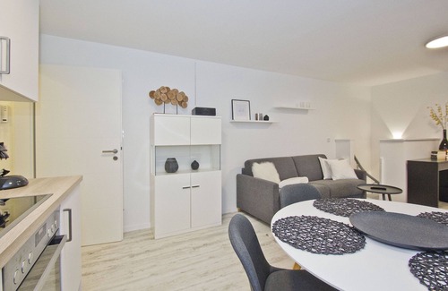 Lietzow Apartment | Modern vacation apartment with fireplace, balcony - Ferienresidenz Zwei Bodden FeWo111