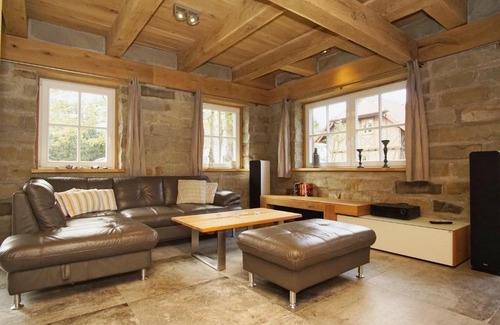 Wiek Apartment | moderne Ferienwohnung mit Kamin, Sauna, Terrasse - Ferienhaus Stenhuus FeWo 01