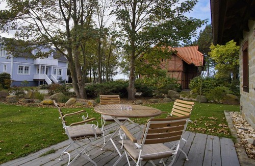 Wiek Apartment | moderne Ferienwohnung mit Kamin, Sauna, Terrasse - Ferienhaus Stenhuus FeWo 01