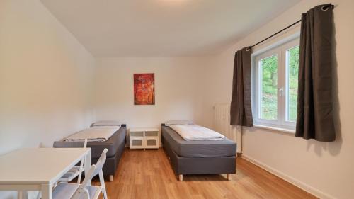 Ehrang-Quint Apartment | Monteurwohnungen in Trier - Parkplatz - Einzelbetten - Waschmaschine und Trockner