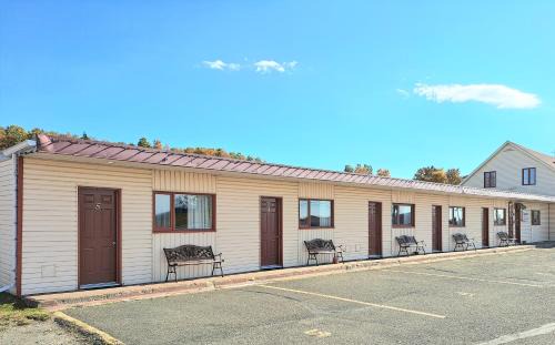 Pointe-au-Pere Hotel | Motel Au Soleil couchant