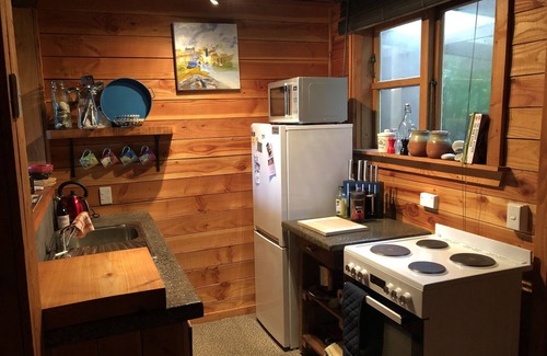 West Coast House | Nestled in the beautiful New Zealand bush a classic Kiwi bach.