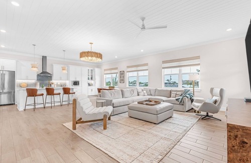 South Island House | NEW Build Modern Beach Beauty on Canal with Heated Pool 150 yds to beach Access