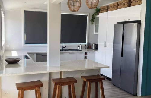 Whangaruru House | New: House & Cabin steps from the beach, with space and privacy for two families