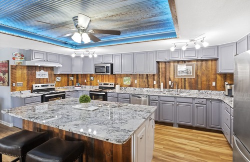 Sunrise Beach House | New! Lakefront 8 Bedroom Family Entertainer! Boat Dock, Hot Tub, Fire Pit, Wi-Fi
