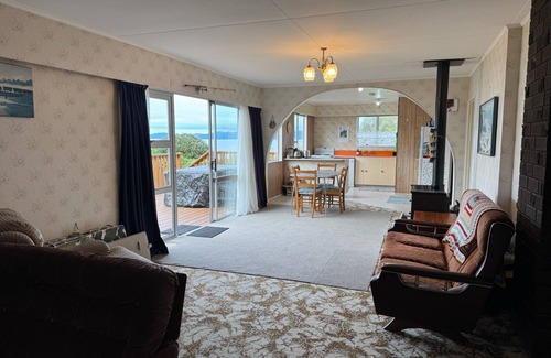 Parapara House | *NEW LISTING* Beachfront bach - your slice of paradise.