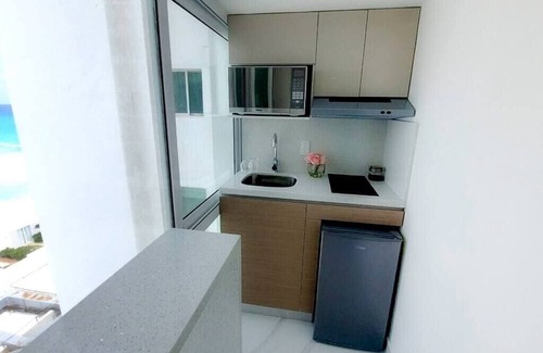 Zona Hotelera Apartment | New Studio at the beach, side ocean view