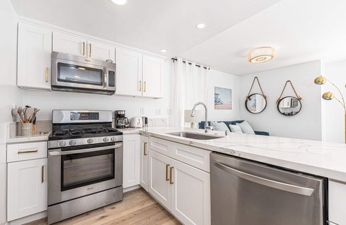 West Newport Condo | Newly Remodeled 7BR Home | Stylish Interior | Steps to Sand!