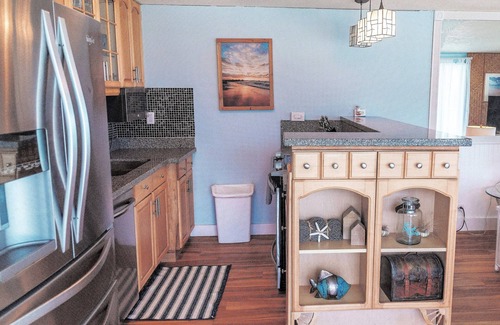 Punaluu Condo | North Shore end unit with wrap around lanai on Secluded Beach