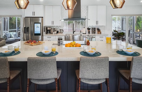 North Palm Beach House | Ocean Waves Escape! An Upscale Poolside Retreat!