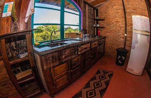 Laguna House | Octagonal house in demolition wood (OkaMauna)