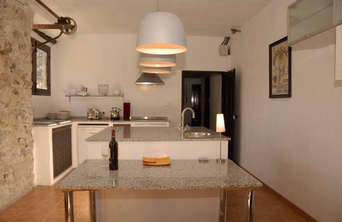 Montefrio House | Old mill, restored in a contemporary rustic style