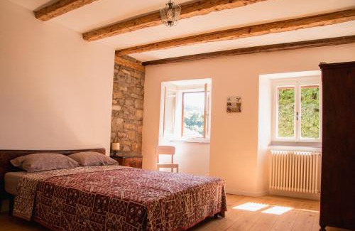 San Dorligo della Valle House | Oltre l'arco