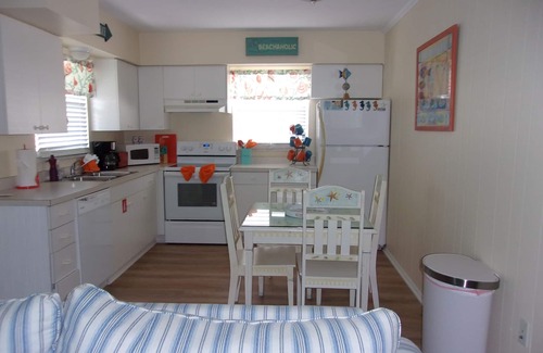 Holmes Beach Apartment | One bedroom 1 bath, pool, steps to Beach! Rent one unit or all three!