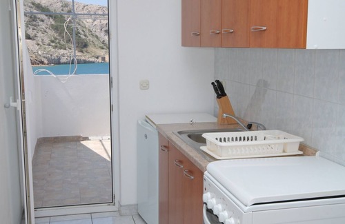 Metajna Apartment | One bedroom apartment with terrace and sea view Metajna, Pag (A-6336-a)