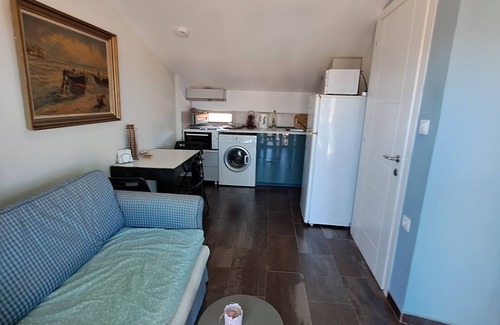 Charakas Apartment | One-bedroom suite on the third floor with panoramic views,accessible by elevator