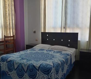 Veintiseis de Octubre Hotel | Orquídea's Hotel