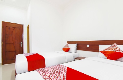 Dumai Hotel | OYO 91301 Lewis Dc Guesthouse