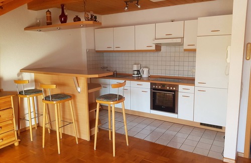 Neustadt Apartment | Panoramic view over Titisee-Neustadt in 2-room top floor apartment with balcony