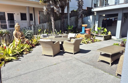 Welcome Bay Apartment | Panoramic vista from city to the sea. Enjoy the opulence of gardens and space