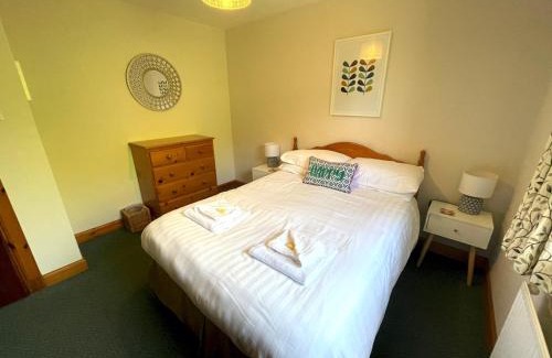 Sandyhills House | Pass the Keys Beautiful 3BR Lodge - Stunning Beach and Golf Location