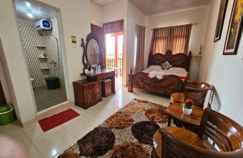 Kamang Magek House | Penginapan Bunga Sonsang kamar Family Tripel