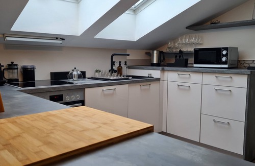 Wildau Villa | Penthouse in Waterfront Villa Including Wifi Parking Balcony Netflix