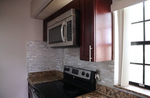 Prestwick Chase House | PGA National home 2BR Retreat patio gated golf community swimming pool