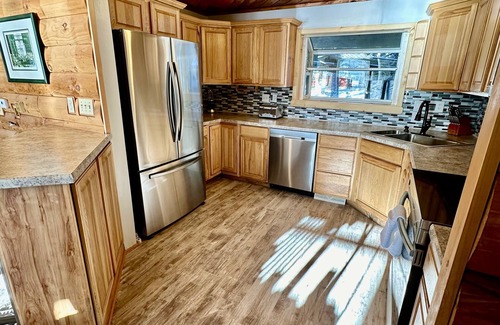 Brantingham House | Pleasant Lake House with private docks and large decks!