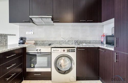 Bur Dubai Apartment | Pleasant Studio at Sky Gardens DIFC by Deluxe Holiday Homes