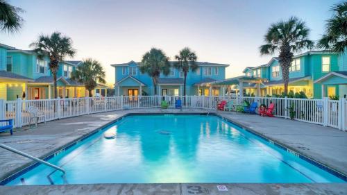 Cinnamon Shore House | Pool Patio Blocks to the Beach Golf Cart Zone Daiquiri Daze by AvantStay