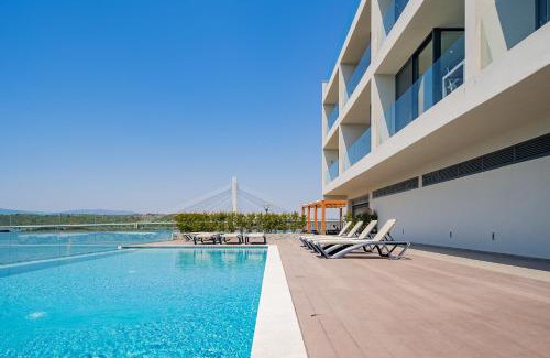 Mexilhoeira da Carregacao Apartment | Portimão Ocean Breeze With Pool by Homing
