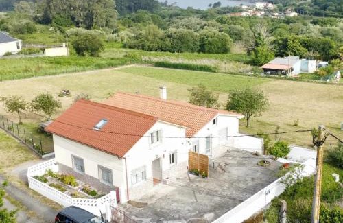 Ares House | Pozo das Leiras-izquierda-