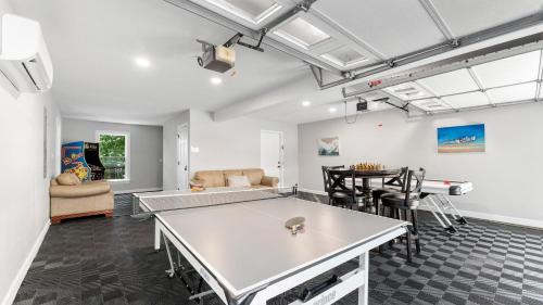 Mayhew House | Private Dock Hot Tub Game Room Firepit Sunset Shores Resort The Homestead