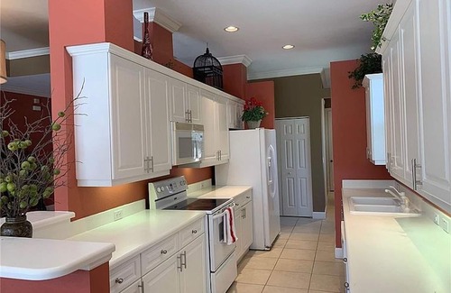 North Naples House | Private home heated pool and spa in a quiet gated community Vanderbilt Beach.