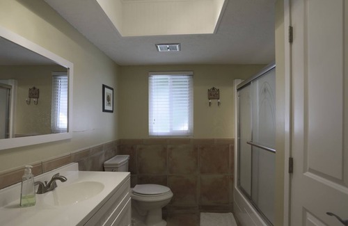 Belair Bayou House | Private Tropical Oasis- Pool, Hot tub, Pool table, Exercise Equip, Darts, & Golf
